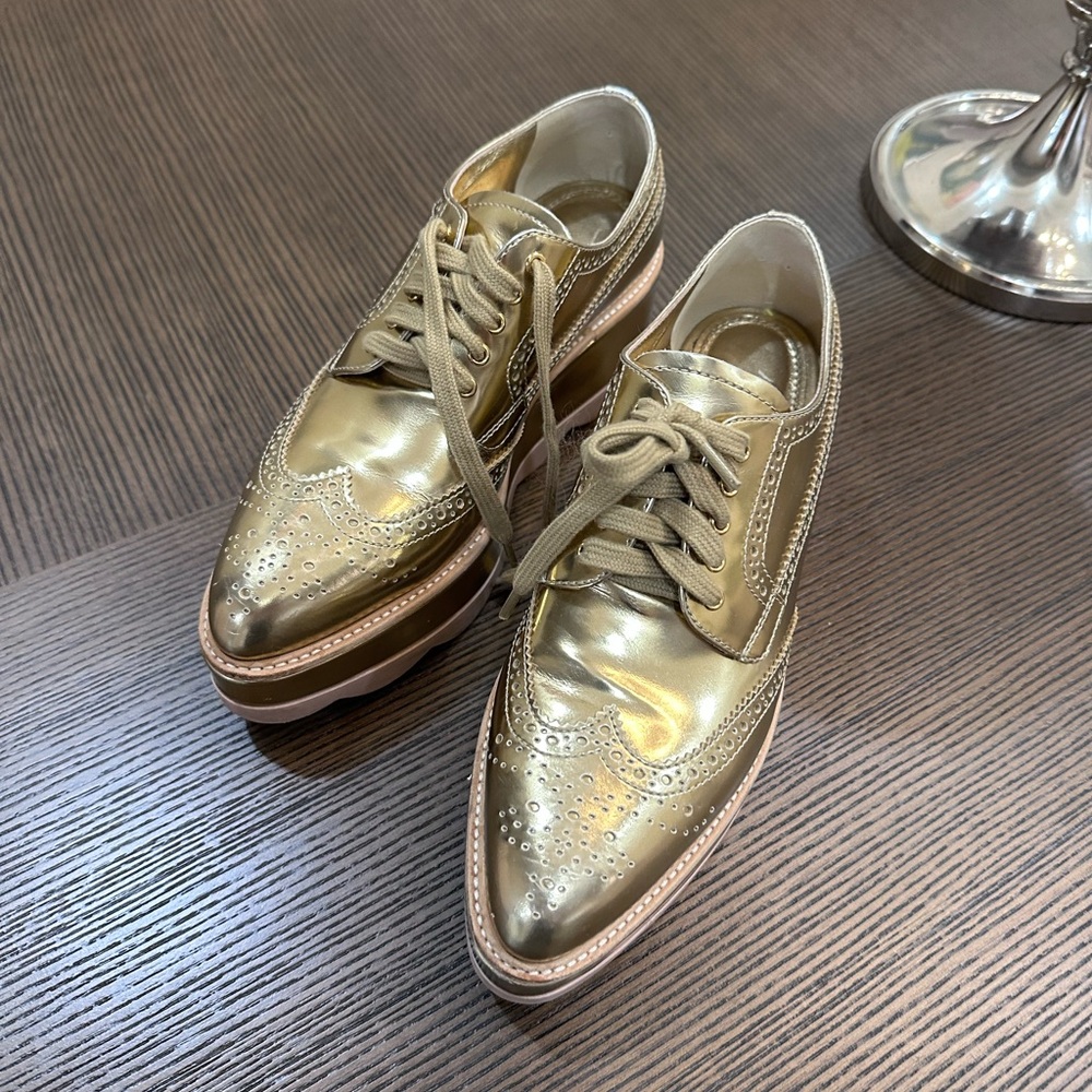 Prada Platform Brogues used. Gold. Only use one